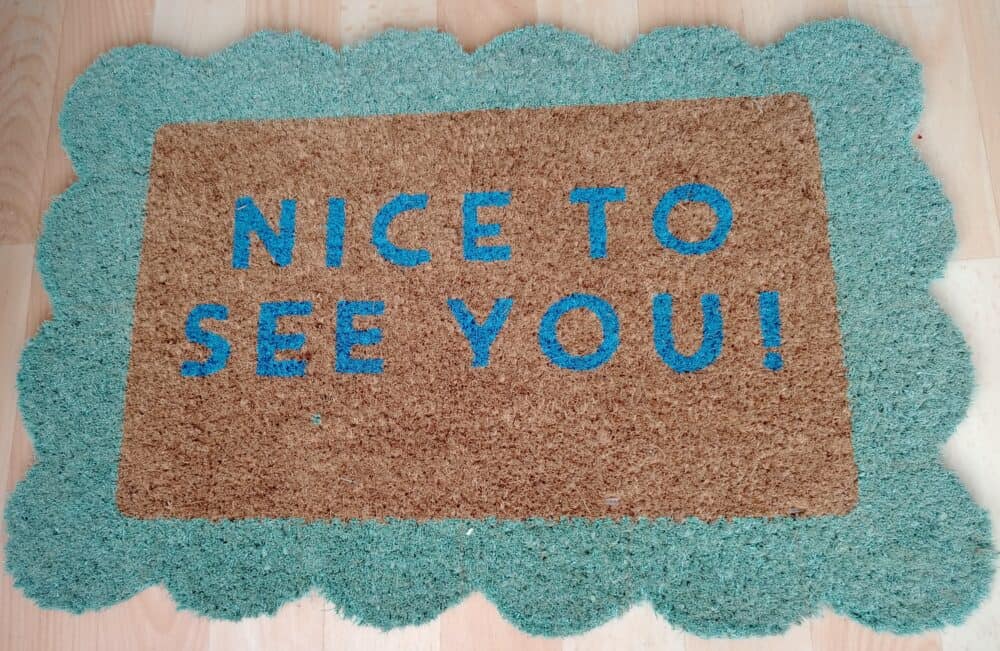 Add a Welcome Mat and Stylish Décor